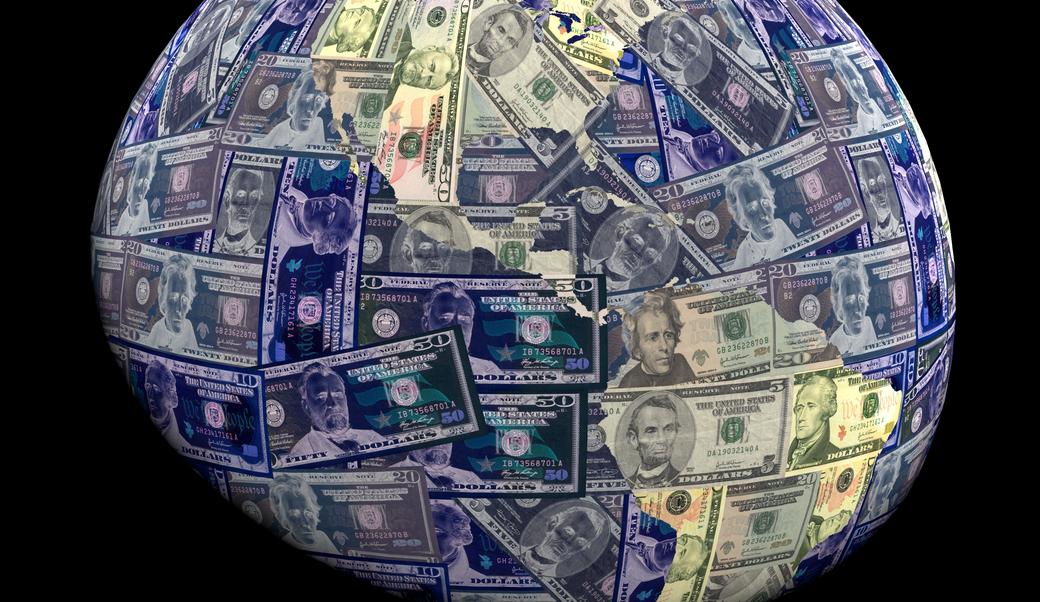 globe with USA currency overlay
