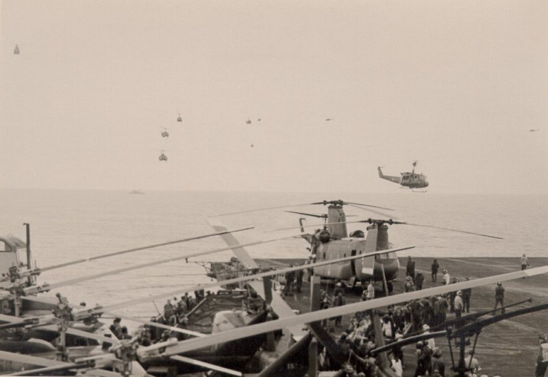 South Vietnamese Huey and CH-47 Chinook helicopters land on the aircraft carrier USS Midway