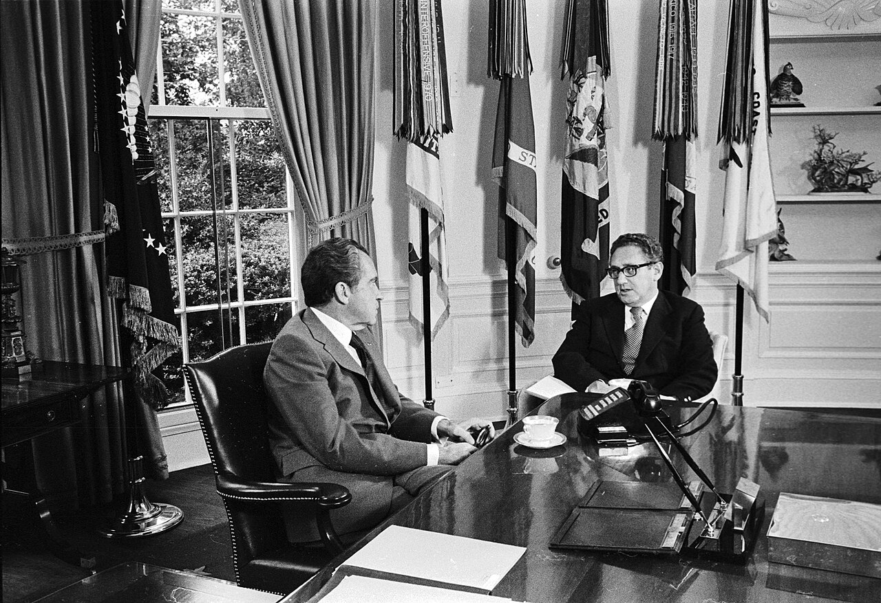 President Richard Nixon and National Security Advisor Henry Kissinger sit in the Oval Office
