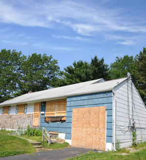 Boarded up house