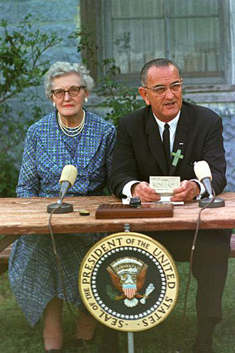 Lyndon Johnson signs education bill