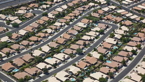 The growth of suburban neighborhoods drained older cities of residents and revenue.