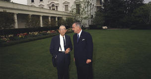 Congressman Howard W. Smith stands outside the White House on the lawn with President Lyndon B. Johnson