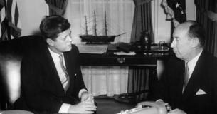 President Kennedy listening to Adlai Stevenson