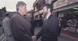 President Clinton shakes hands with Gerry Adams