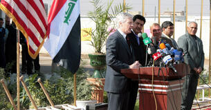 Ryan Crocker, the U.S. Ambassador to Iraq, speaks to a crowd of more than 200 people at the official opening of the Sadr City Rusafa Water Treatment Facility