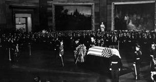 LBJ laying a wreath on President Kennedy's coffin