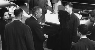 LBJ greets Jackie Kennedy at the funeral of President John Kennedy