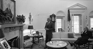 Barry Goldwater and LBJ in the Oval Office looking at a portrait of Franklin Roosevelt