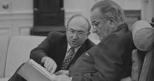 President Johnson and Wilbur Cohen talking