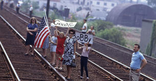 People on railway line, waiting for funeral train for Bobby Kennedy