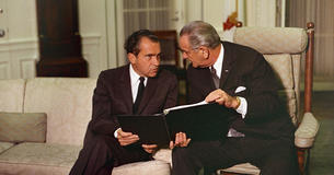 Richard Nixon and LBJ sitting next to each other 
