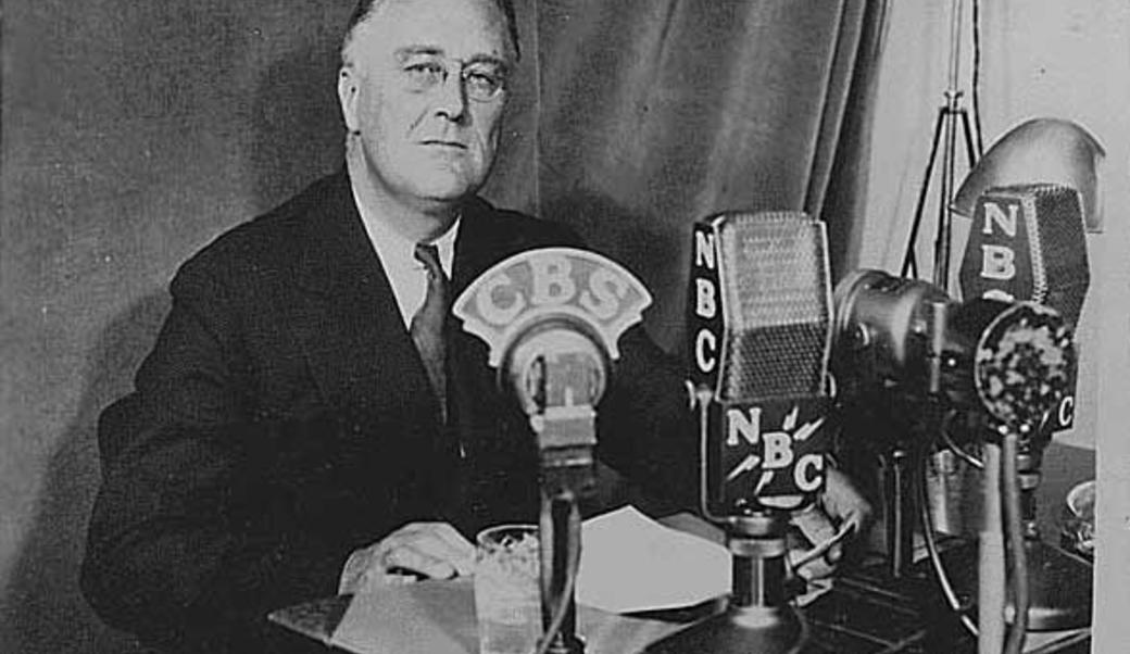 President Franklin Roosevelt in front of microphones