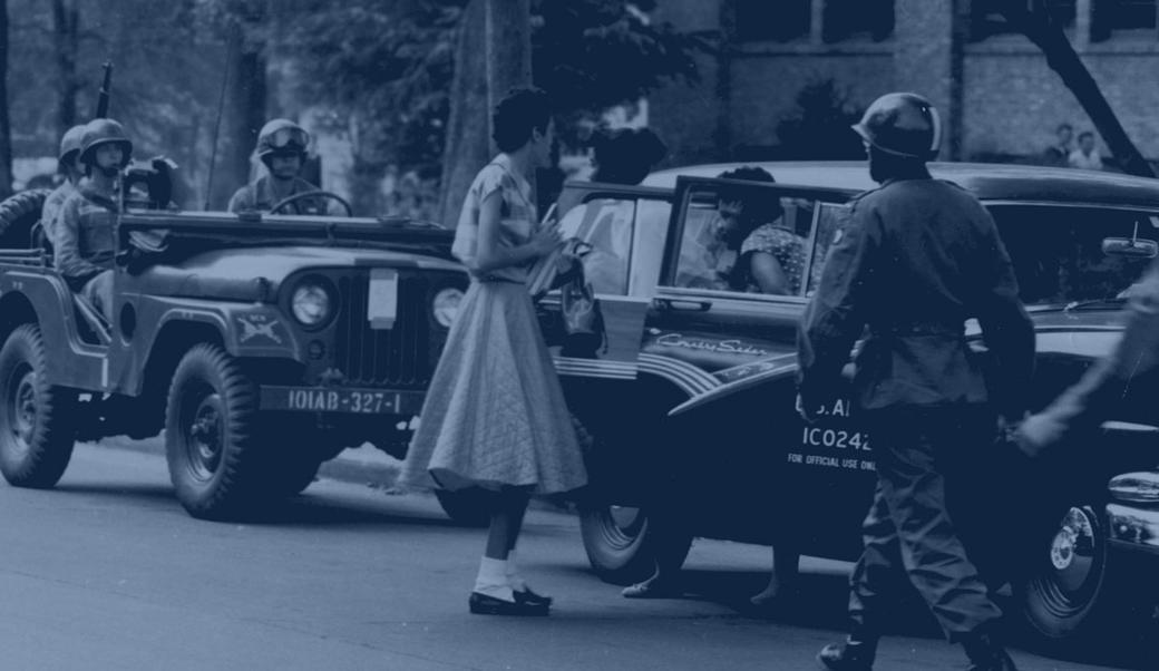 Soldiers from the 101st Airborne Division escort African-American students to Central High School in Little Rock in September 1957.
