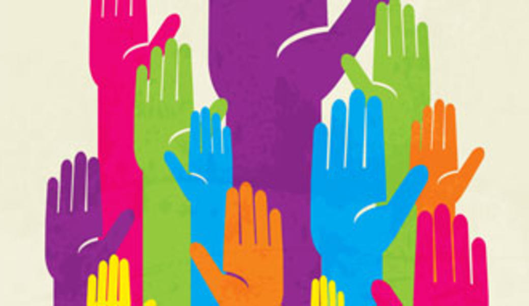 hands raised to illustrate democracy