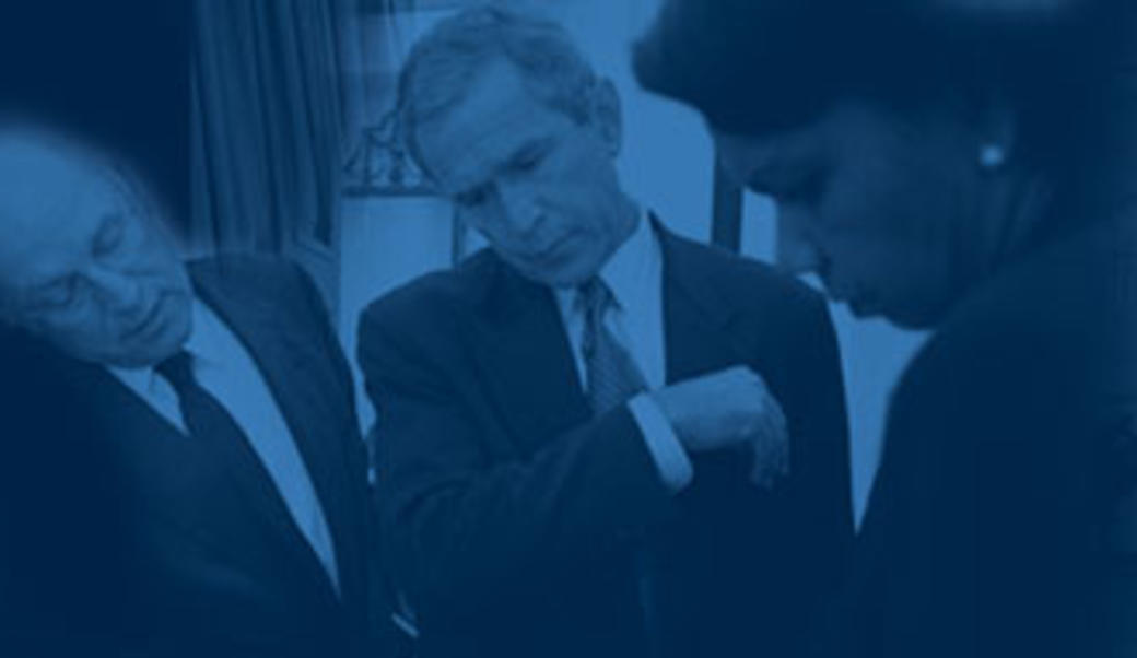 President George W. Bush with Dick Cheney and Condoleezza Rice