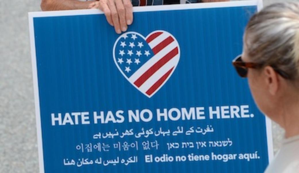 "hate has no home here' sign