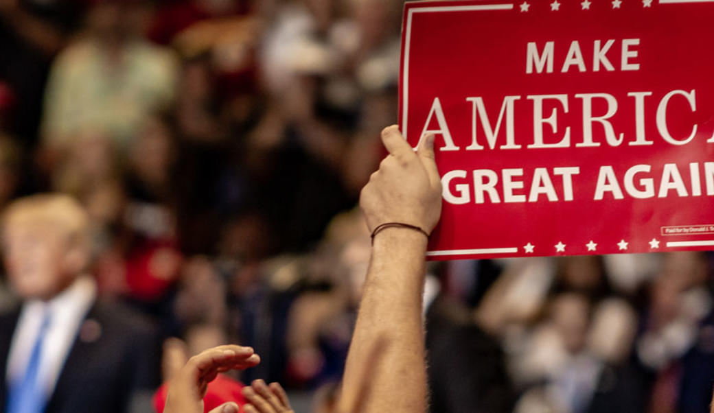 Trump rally with "Make America Great Again" sign