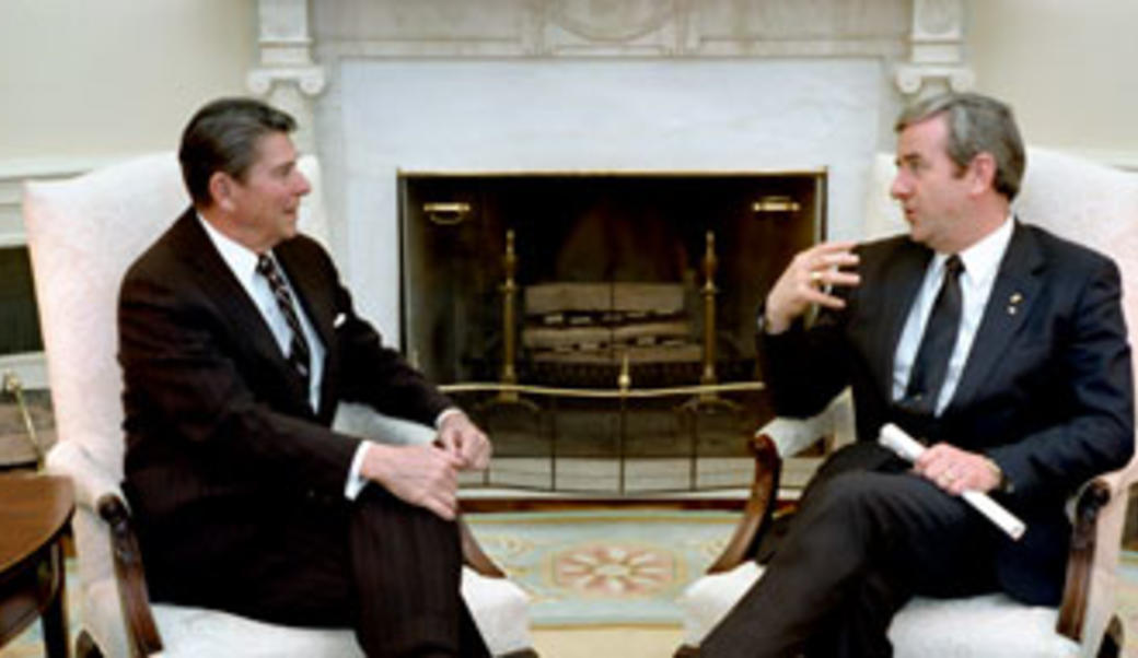 Ronald Reagan sits with Jerry Falwell