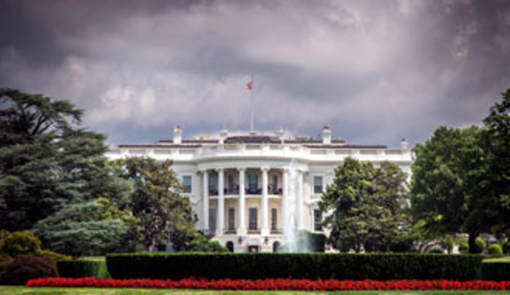 White House with storm clouds