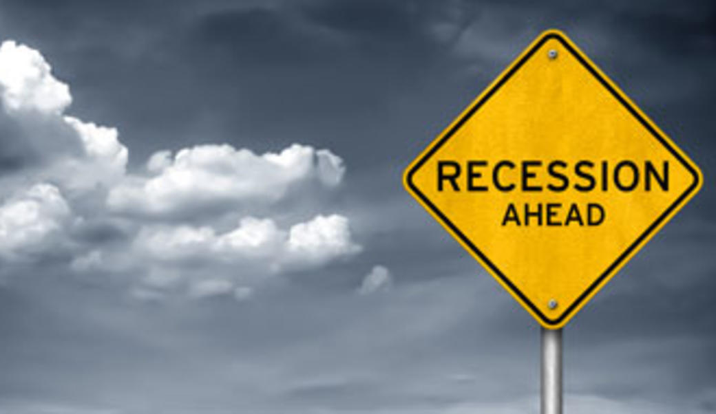 Recession Ahead on a yellow yield sign