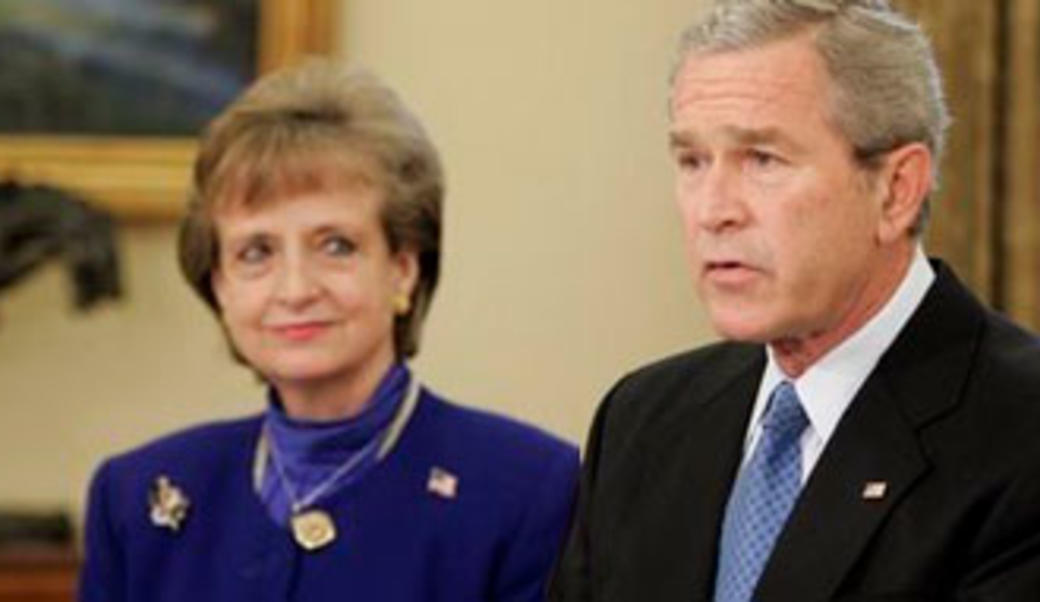 George Bush with Harriet Miers standing to his left