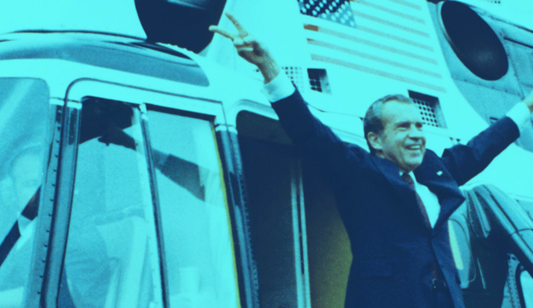 Nixon waving goodbye in front of helicopter