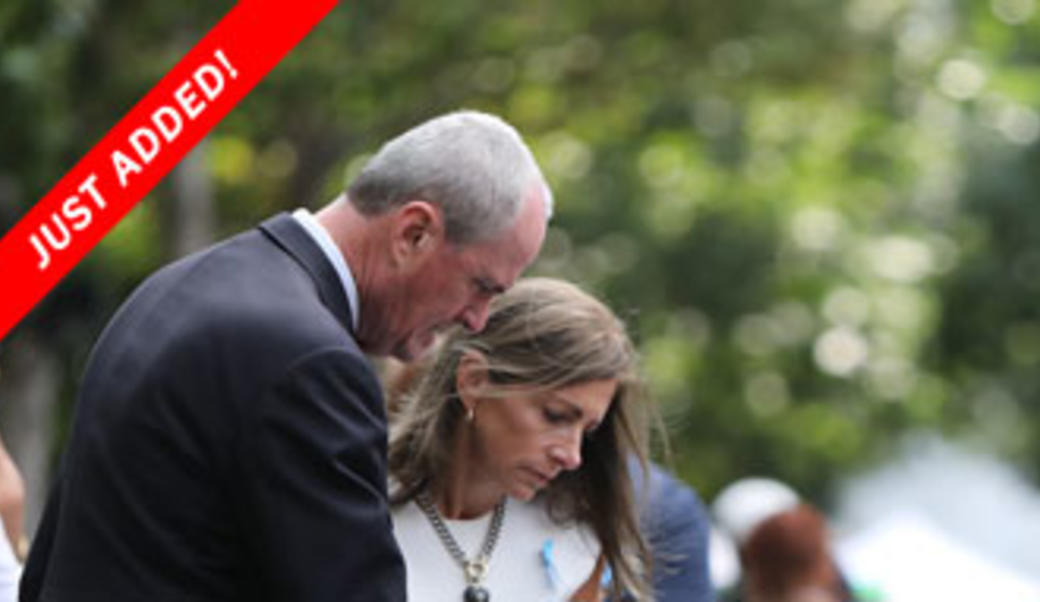 Governor and Tammy Murphy in profile looking down