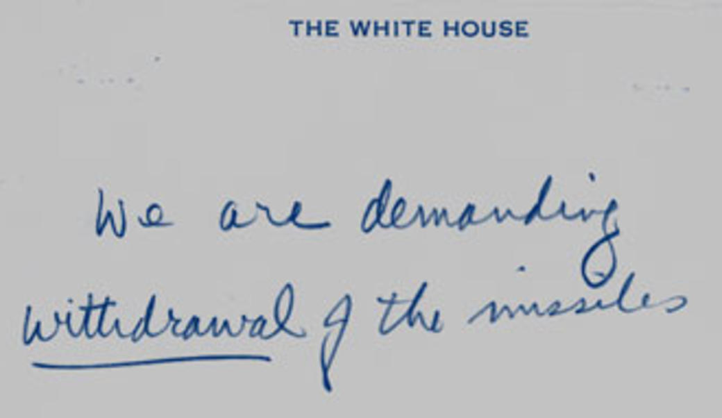 Handwritten note from Cuban Missile Crisis saying "we are demanding withdrawal of the missiles"