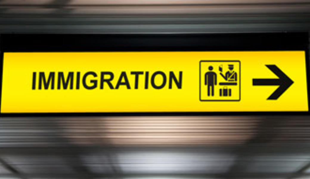 yellow immigration sign