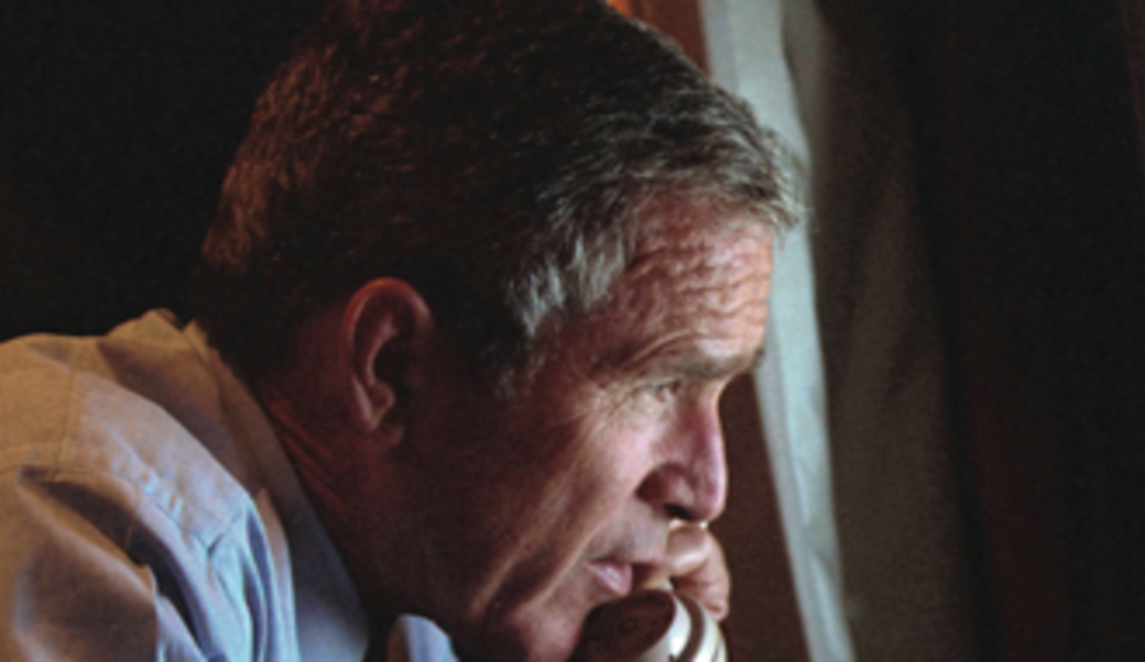 George W. Bush on the phone looking out the window