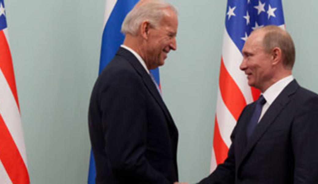 Joe Biden shaking hands with Vladimir Putin