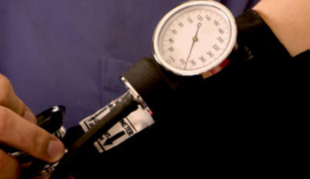 close up of blood pressure cuff and gauge 