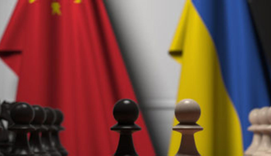 China and Ukraine flags in front of a chessboard