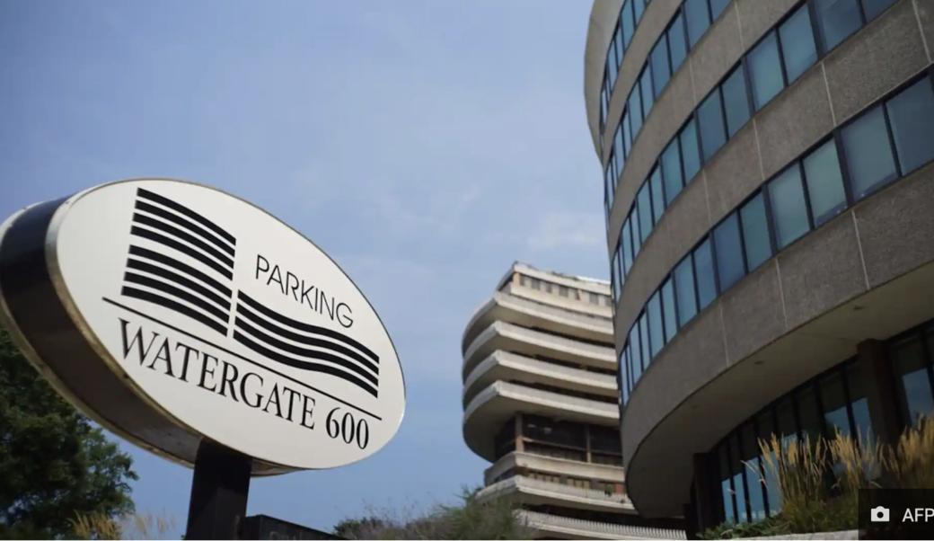 Watergate Hotel sign with hotel building in the background