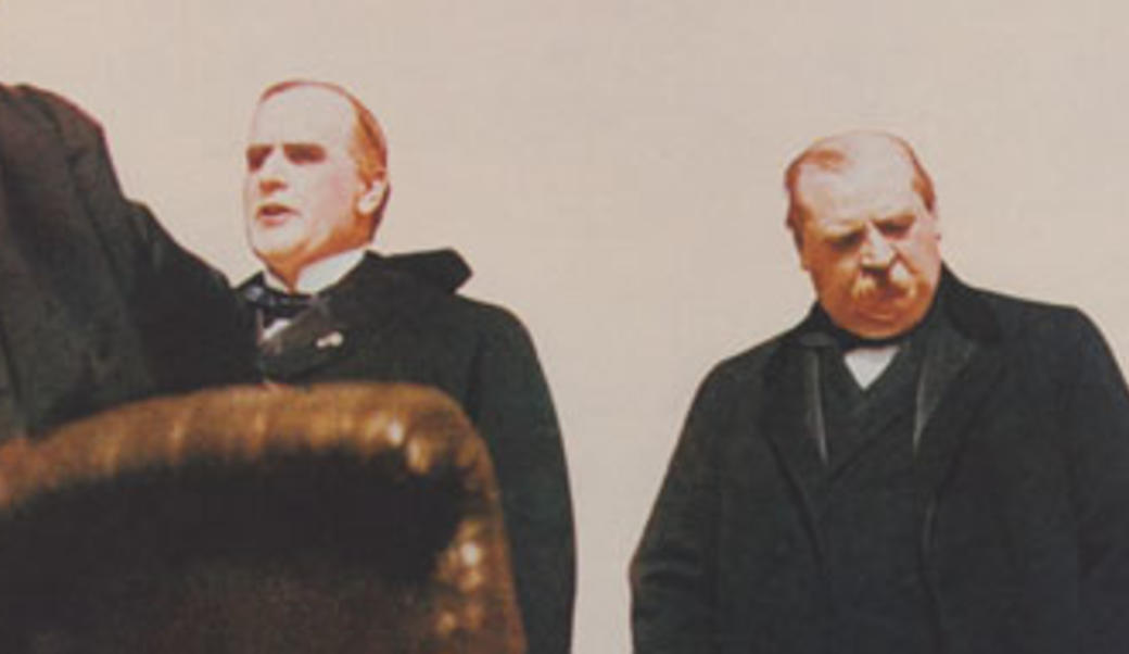 President William McKinley takes the oath of office from Chief Justice Melville Fuller. At right stands outgoing President Grover Cleveland, who lost the 1896 election to McKinley. March 4, 1897