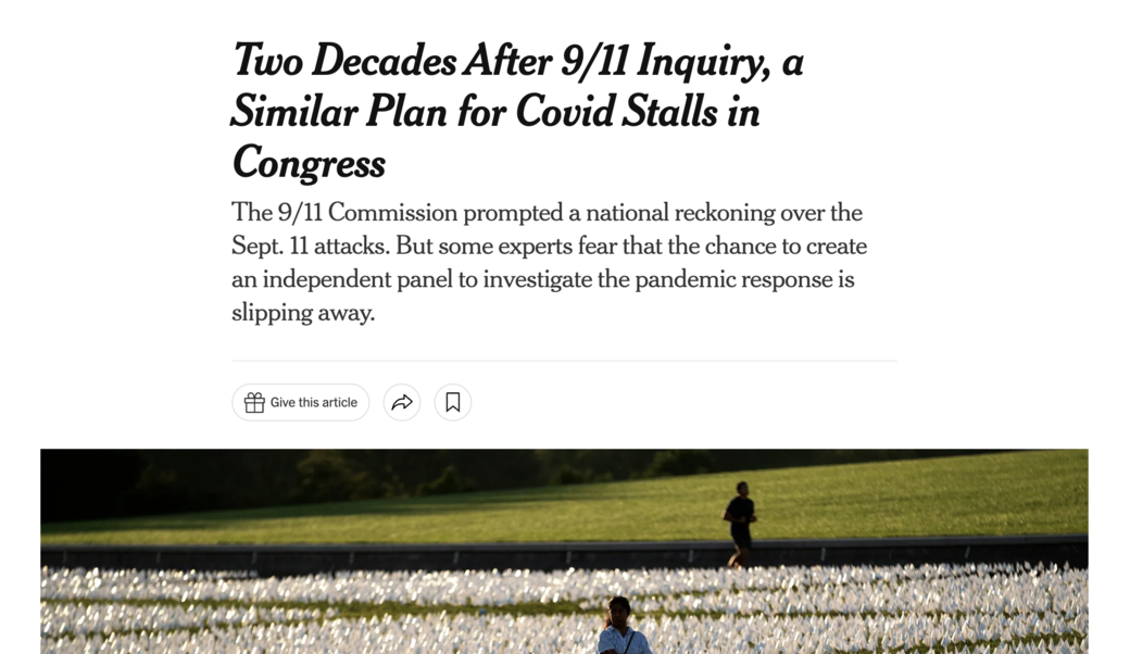 screenshot of article headline and photograph of a memorial in Washington last year for victims of Covid-19 with white flags on a field.