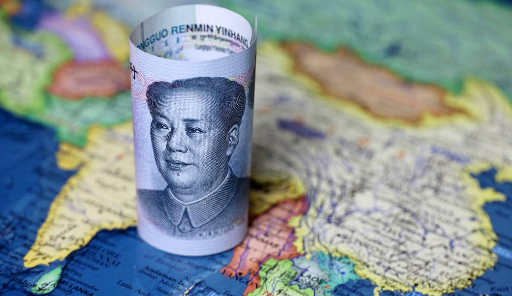 Chinese yen on globe