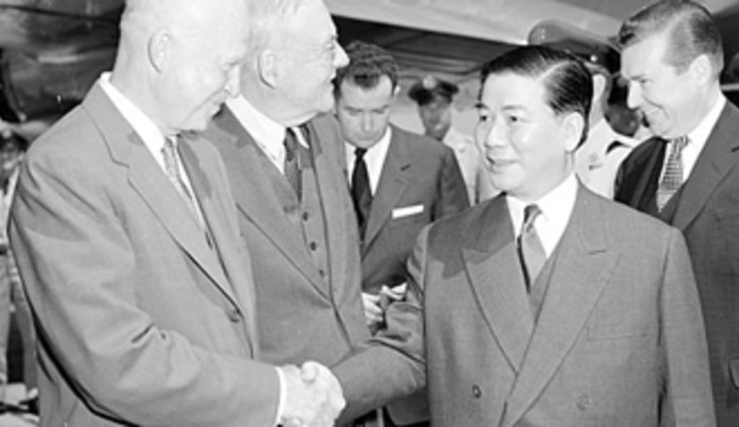 U.S. President Dwight D. Eisenhower and Secretary of State John Foster Dulles greet South Vietnamese President Ngo Dinh Diem at Washington National Airport on May 8, 1957.