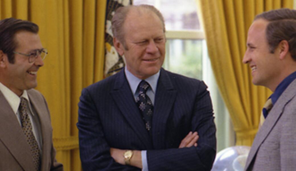 President Ford chats with Donald Rumsfeld and Richard Cheney