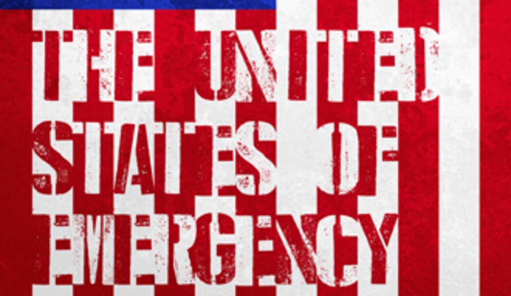 United States of Emergency painted in stencil letters