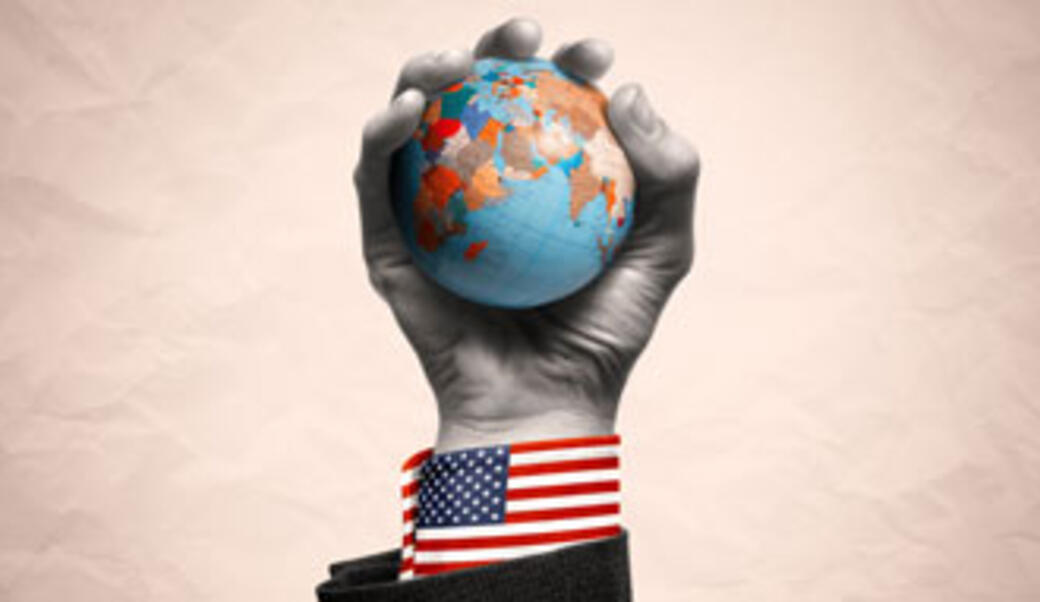 hand holding a ball with globe illustration