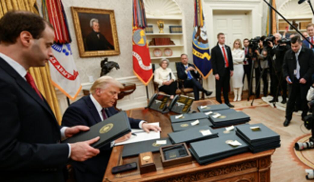 President Trump signing executive orders on January 20, 2025.