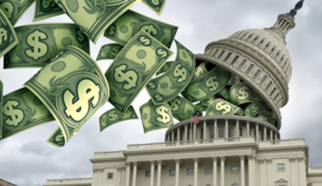 image of US Capitol with dollars flying out