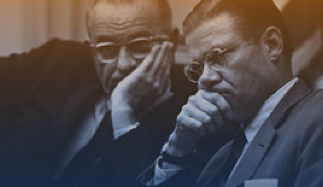 Lyndon Johnson and Robert McNamara looking grim