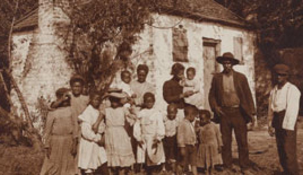 Slaves in front of quarters