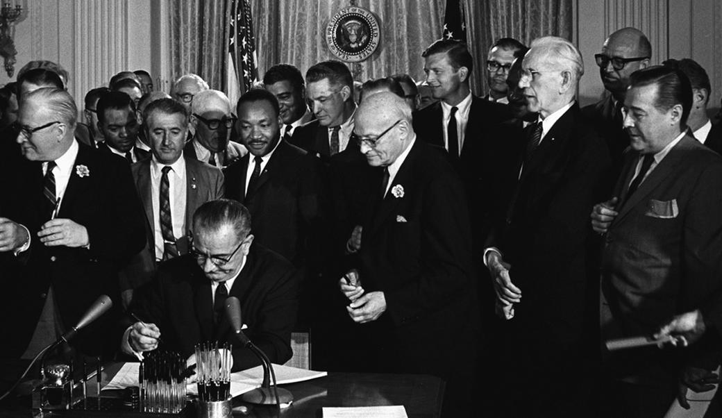 LBJ Signing Civil Rights Act of 1964 with Martin Luther King and others in the white house. 