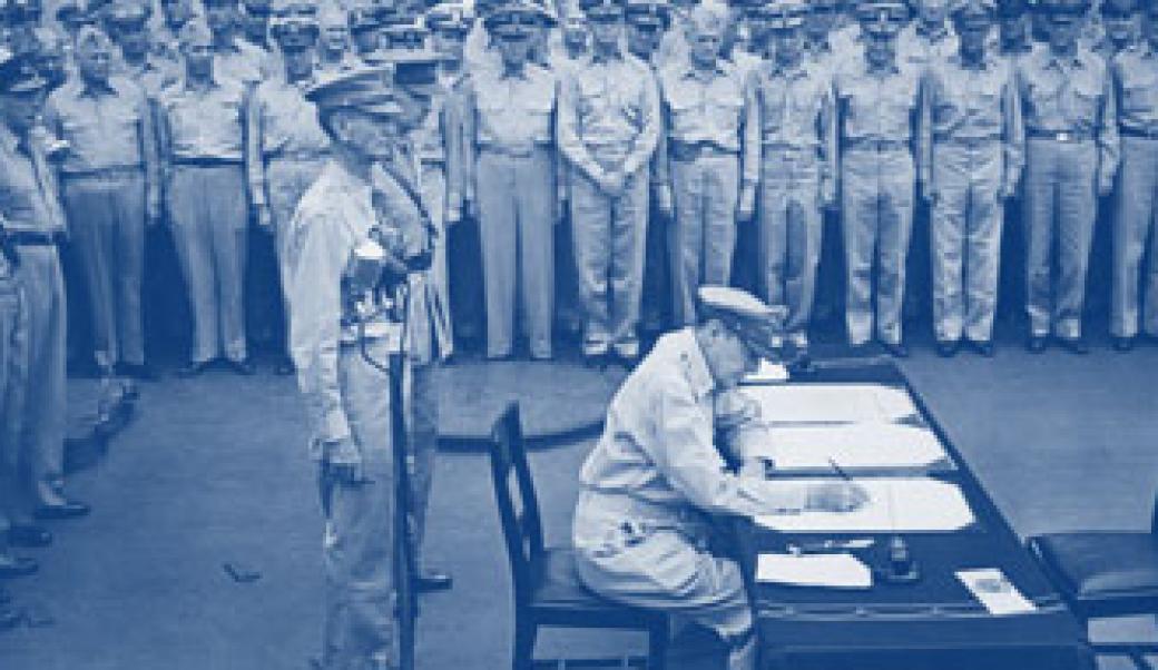 Douglas MacArthur signs instrument of surrender aboard USS Missouri