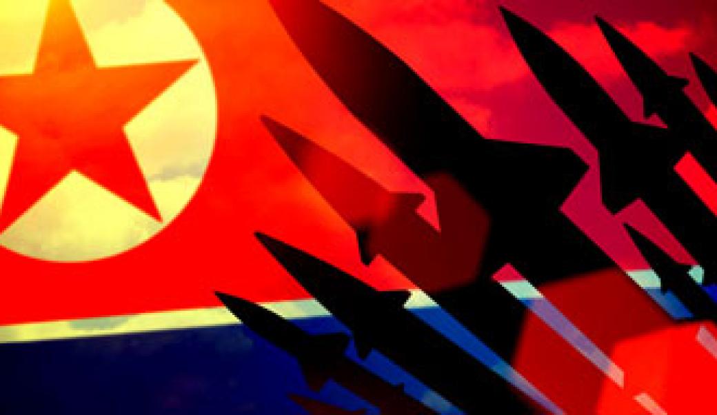 A segment of the North Korean flag with missile silhouettes