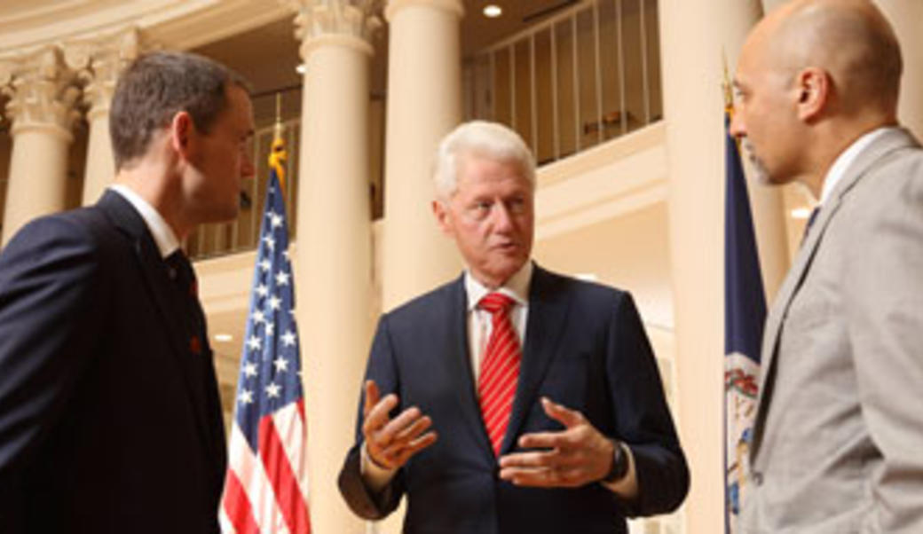UVA President Jim Ryan, President Bill Clinton, and Bill Antholis
